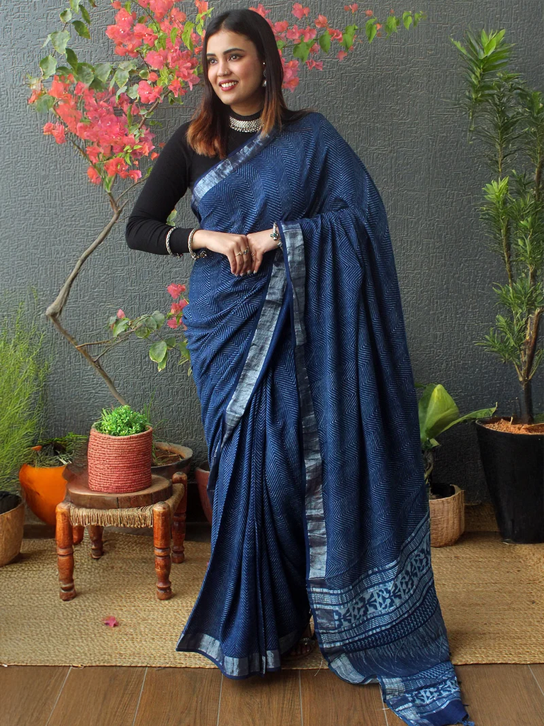 An Indigo Cotton Saree With A High-Neck Blouse